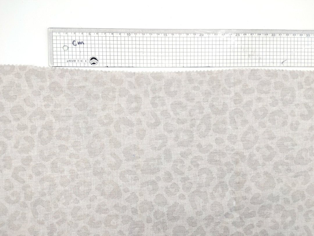 Luxe Safari Elegance: 100% Linen Fabric in Natural Hue with Gold Foil Leopard Print - The Linen Lab - Natural